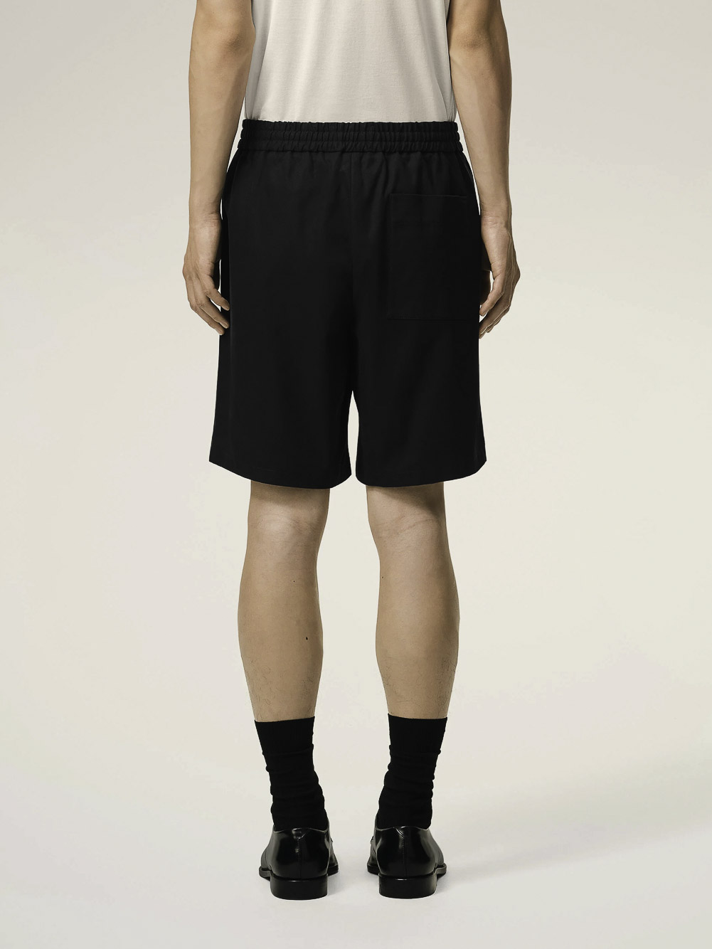 ELASTICATED WAIST SHORTS WITH EMBOSSED AMI