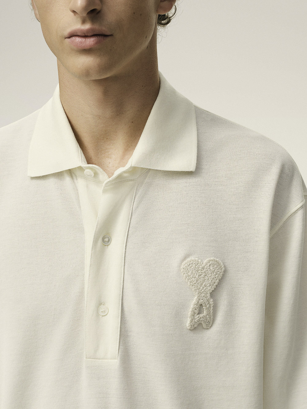 BOXY FIT POLO WITH AMI DE COEUR KNITTED PATCH